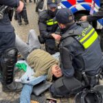 In Amsterdam, clashes trigger a divisive blame game as old wounds reopen