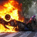 Football diehards and Argentinian retirees protest pension reform