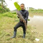 Malaysia’s ‘fish hunters’ target invasive species, one catch at a time