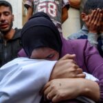 Israeli attacks on Gaza kill 34 people, including several near aid site