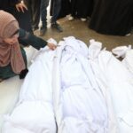 Israel kills more than 70 in Gaza, including 16 in bombing family building