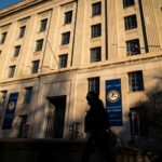 Two Chinese nationals charged for trying to recruit spies in US military