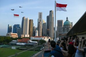 Singapore celebrates success on 60th anniversary but challenges loom ahead