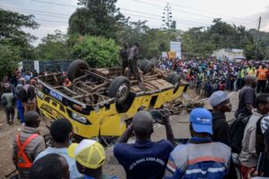 Bus carrying mourners overturns in Kenya, killing 21 people