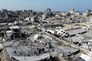 Israel strikes Gaza, halts aid as both sides claim the other breached truce