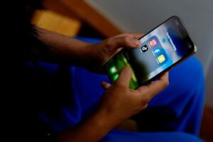 Australia adds Reddit, Kick to social media ban for children under 16