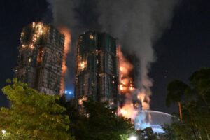 At least 13 dead as fire engulfs Hong Kong high-rise residential buildings