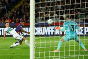 Barcelona beat Elche 3-1 to stay in touch with La Liga leaders Real Madrid