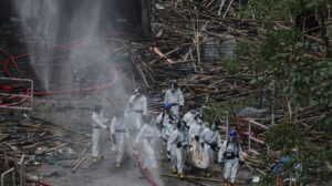 Hong Kong leader orders independent investigation into fire that killed 151