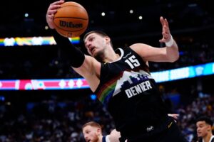 Jokic sets new NBA triple-double record in Nuggets OT victory over Wolves