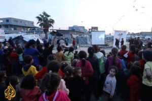 Makeshift movie screenings in Gaza City bring children ‘out of the ruin’