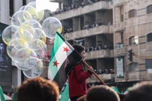 Hope, flags, fireworks as Syria starts to celebrate a year without al-Assad