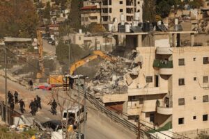 Israeli forces demolish shops in raids near occupied East Jerusalem