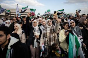 ‘I belong in my own country’: Syrians celebrate a year after al-Assad