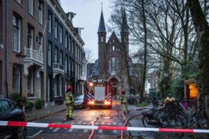 Firework accidents kill two in Netherlands as fire ravages Amsterdam church
