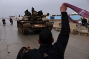 Syrian army takes control of east Aleppo towns as Kurdish fighters withdraw