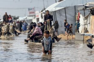 Heavy rains flood Gaza tents as Israel kills two more Palestinians