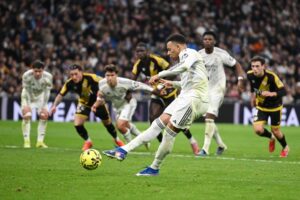 Mbappe’s late penalty gives edgy Real Madrid 2-1 win over Rayo Vallecano