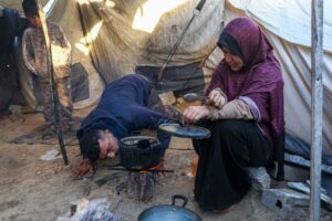 ‘Life covered in soot’: Gas shortage forces Gaza families to cook over wood