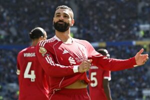 Salah scores in Merseyside derby as Liverpool win to boost European hopes