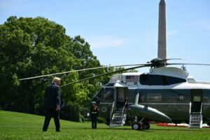Trump downplays US-Iran differences as he heads to Beijing to meet with Xi