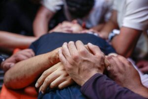 Israeli attacks kill four men and a boy in Gaza and a teenager in West Bank