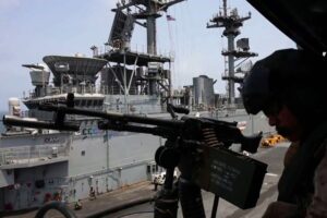 US and Iran hit pause on strikes for second day
